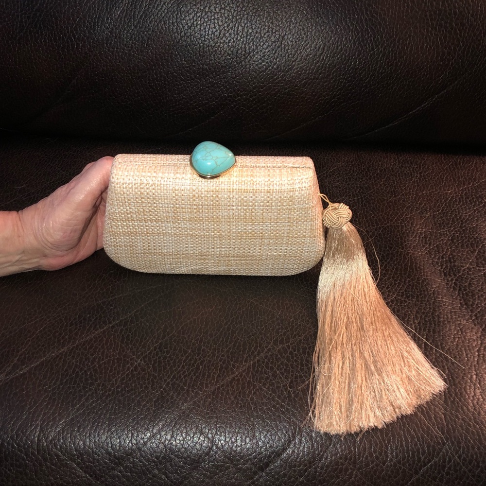 Express tan clutch, turquoise accent, tassel